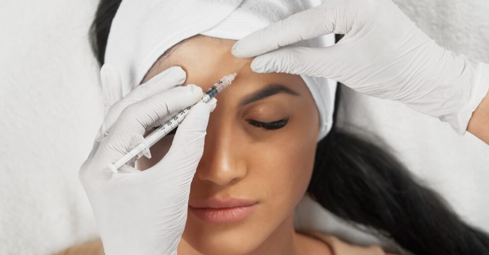 Woman receiving beauty treatment