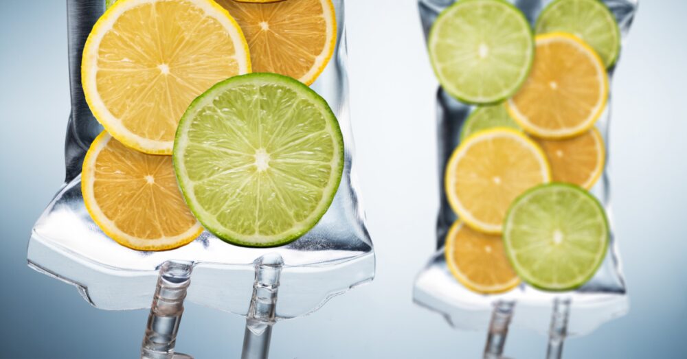 IV drip bags filled with vitamin-infused citrus slices representing customizable IV therapy treatments in Princeton